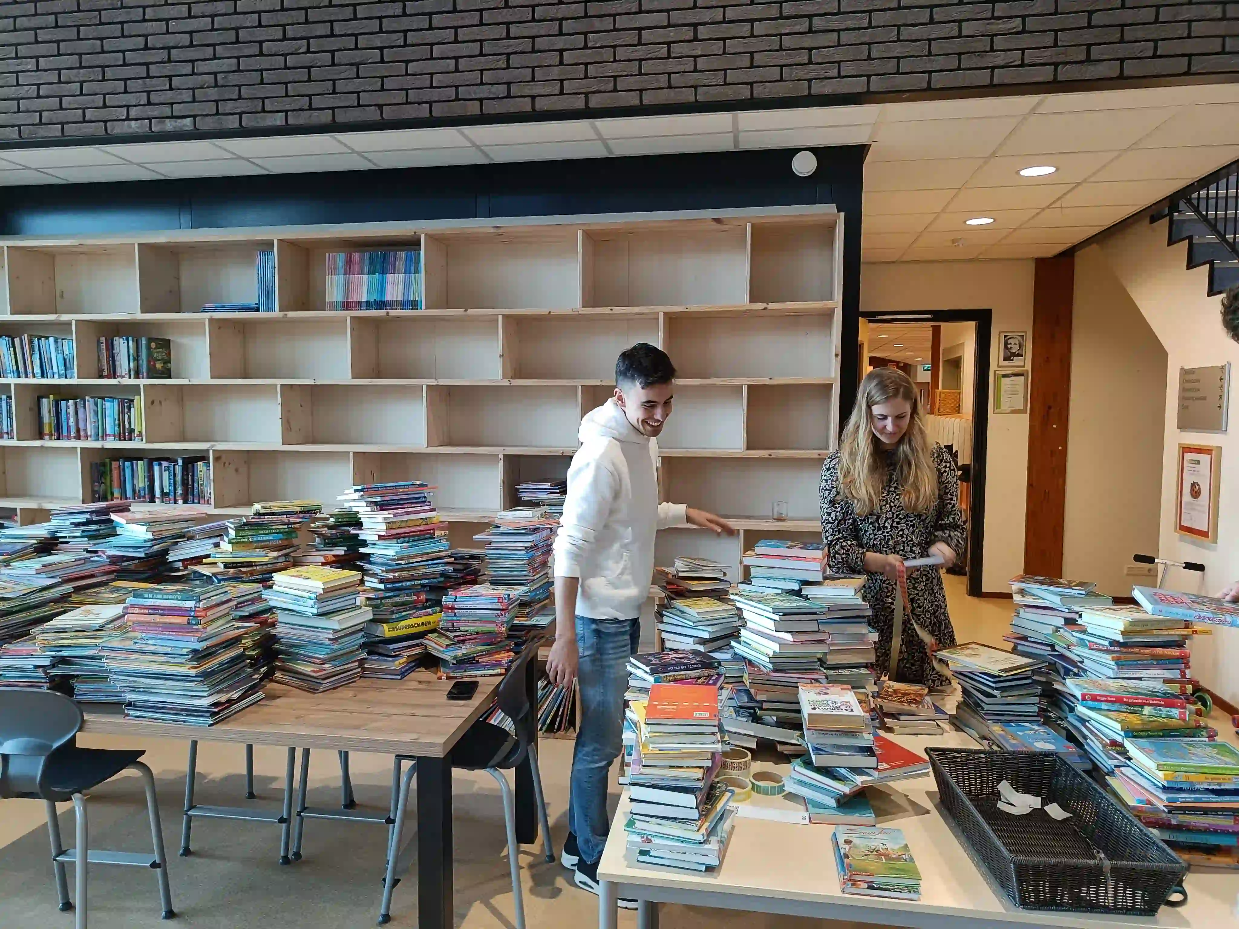 Team in conversation in a school library